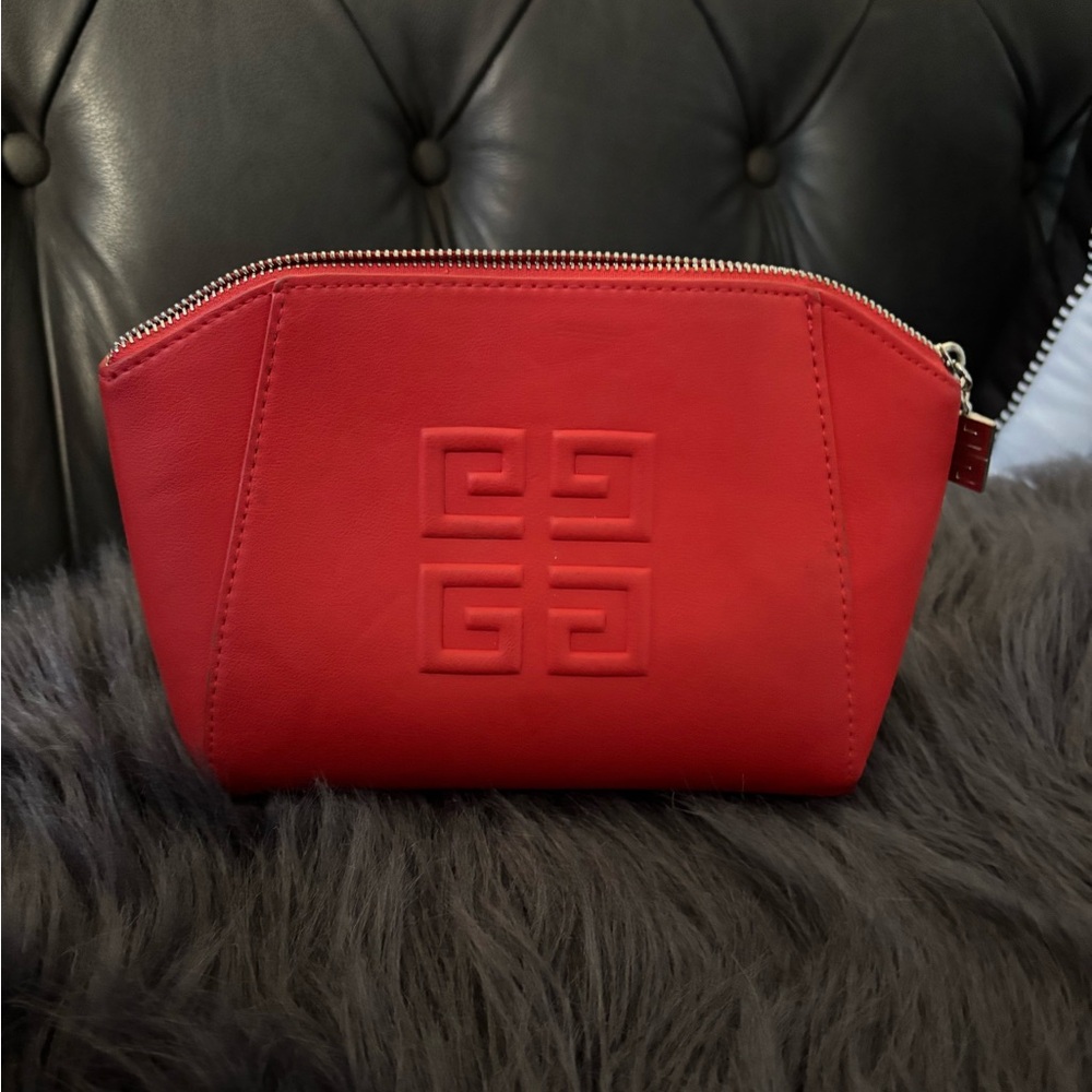 Red Givenchy cosmetics bag